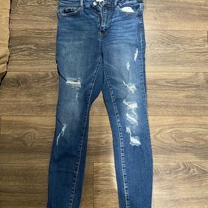 Skinny jeans only worn a few times, small rip under back belt loop!